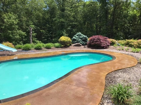 acid stained concrete pool deck 